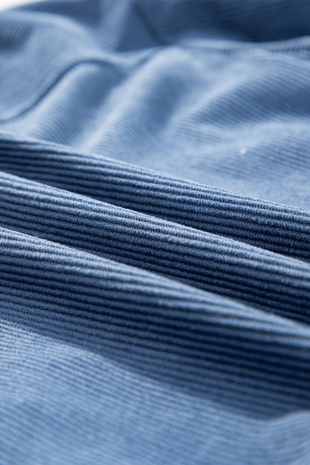 Veste en velours côtelé bleu-vert avec cordon de serrage, capuche et fermeture éclair