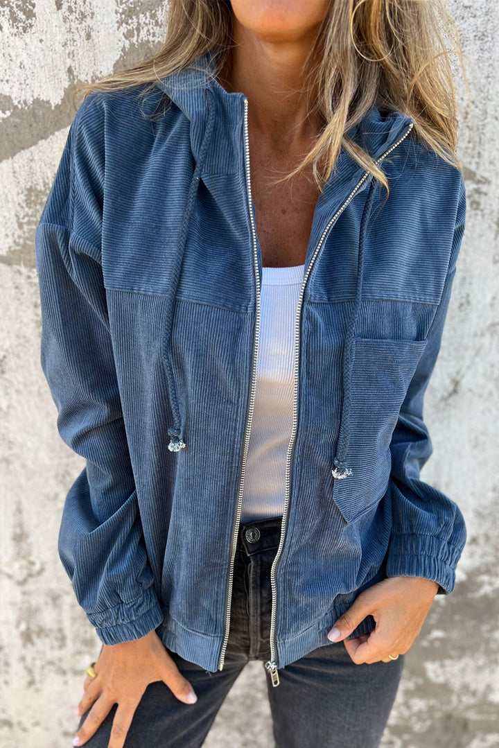 Veste en velours côtelé bleu-vert avec cordon de serrage, capuche et fermeture éclair