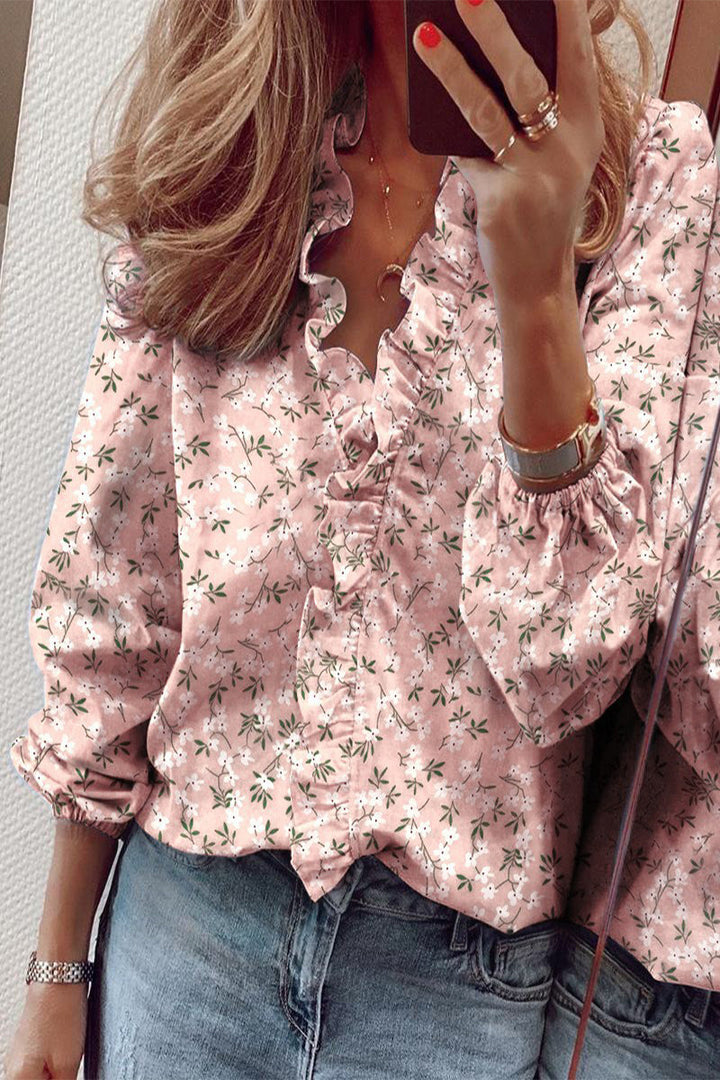 Blouse à manches longues, décolleté en V et volants