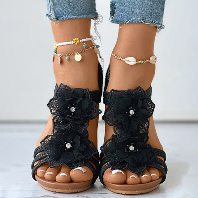 Sandales à talons avec décoration florale