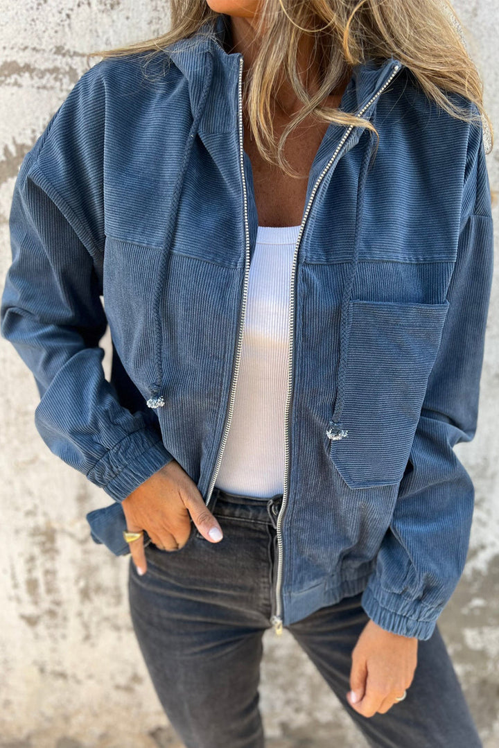 Veste en velours côtelé bleu-vert avec cordon de serrage, capuche et fermeture éclair