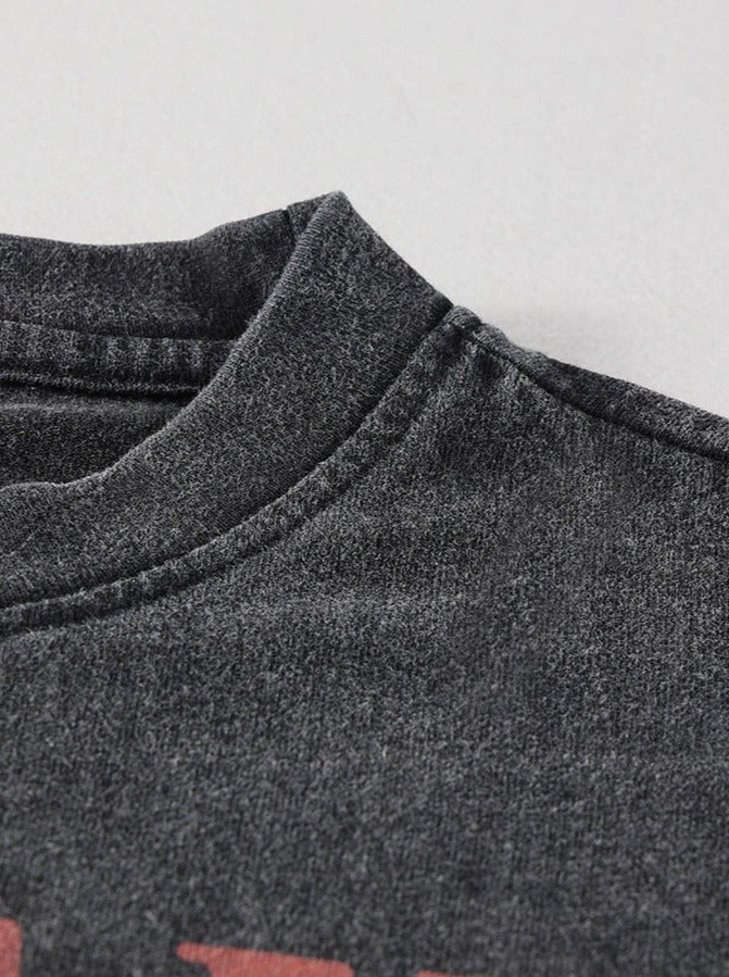 T-shirt lavé et effet usé avec imprimé de groupe de rock et manches courtes