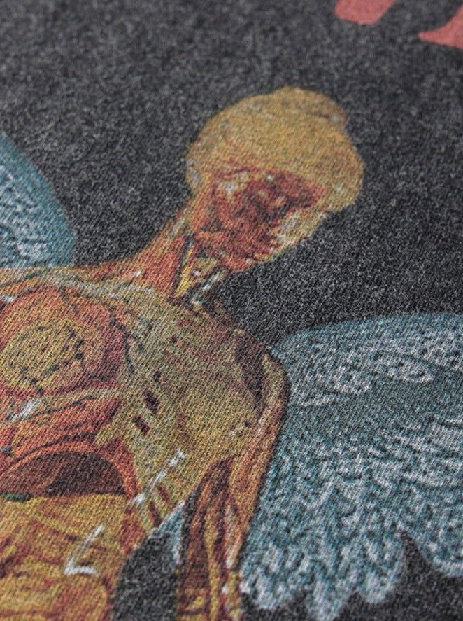 T-shirt lavé et effet usé avec imprimé de groupe de rock et manches courtes