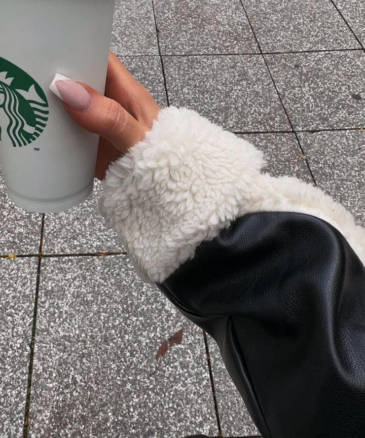 Daria en fausse fourrure noire